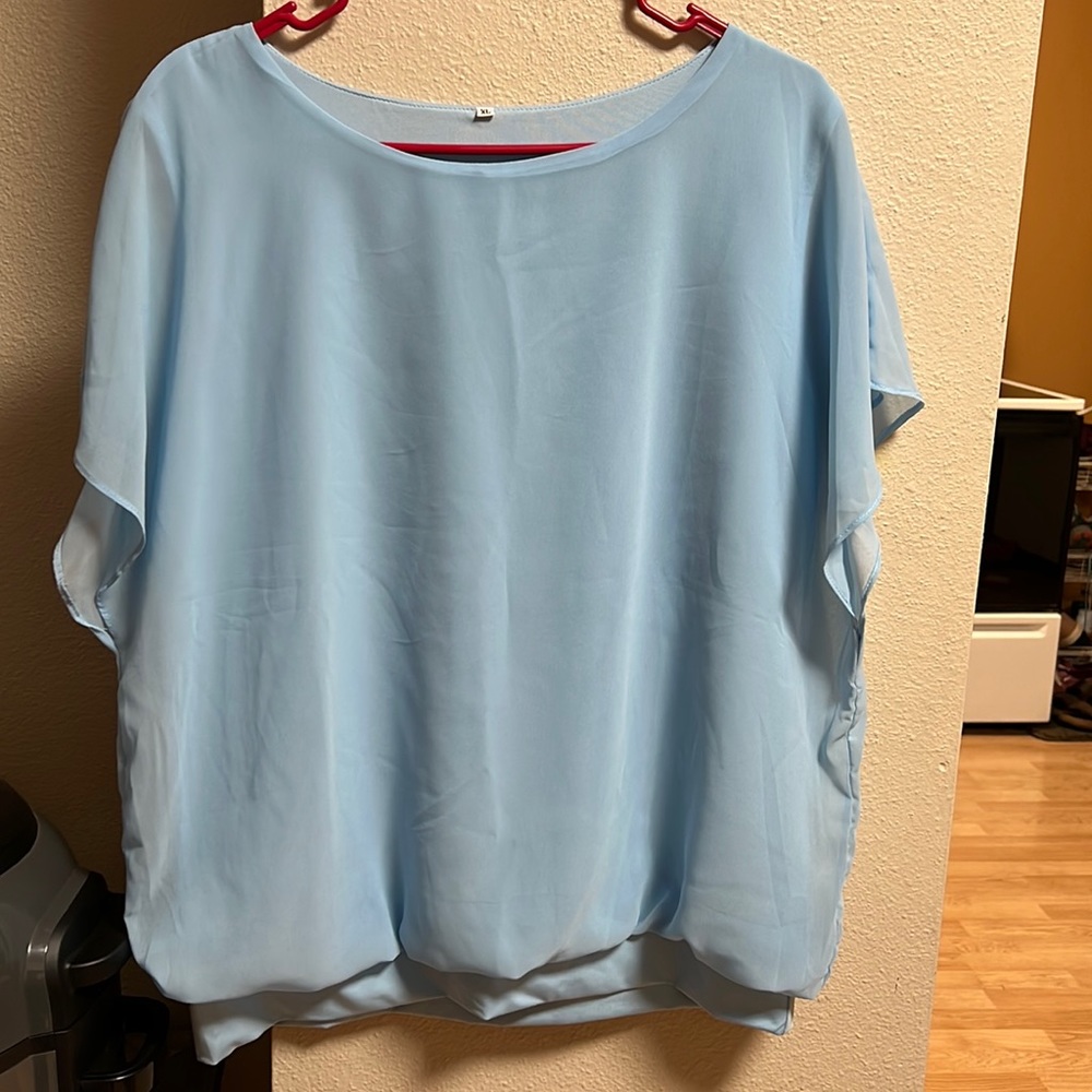 Boutique Women’s XL top.  NWOT.  pet/smoke free home!  Gorgeous baby blue top.